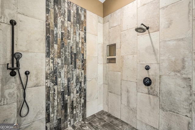 full bath featuring a tile shower