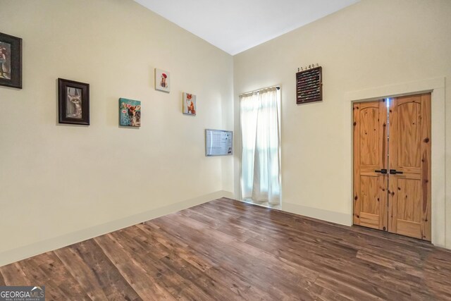 empty room featuring wood finished floors