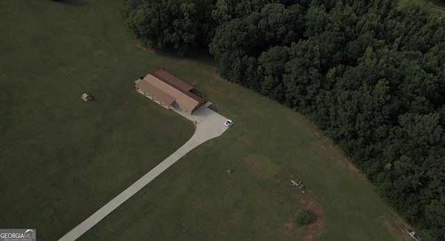 aerial view featuring a view of trees