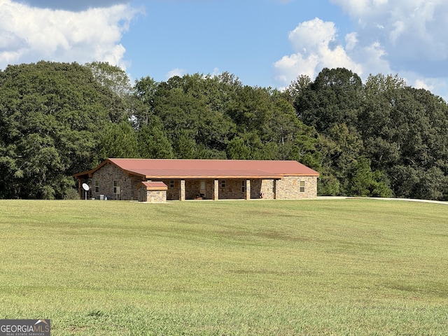 surrounding community featuring a lawn