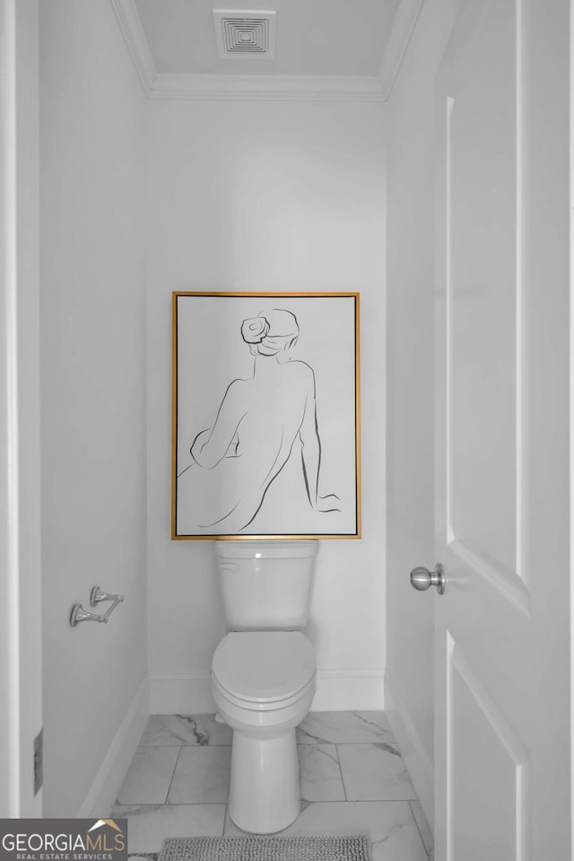 2850 Stonehall Ct SE, Smyrna, GA 30339 - bathroom with marble finish floor, ornamental molding, visible vents, and baseboards