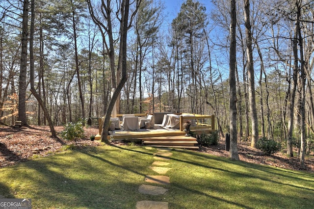 view of yard featuring a deck