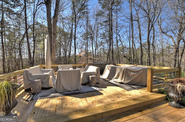 wooden deck featuring grilling area