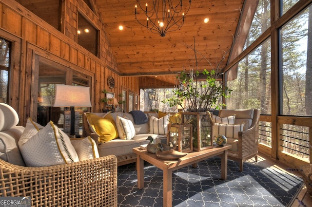 sunroom / solarium with a chandelier, wooden ceiling, and lofted ceiling