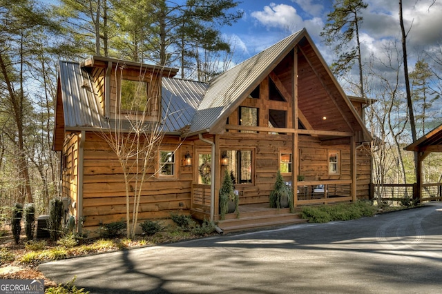 view of front of house featuring metal roof