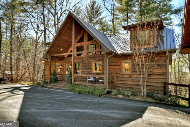 view of front of property featuring metal roof