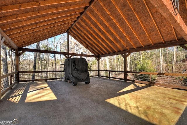 unfurnished sunroom with vaulted ceiling