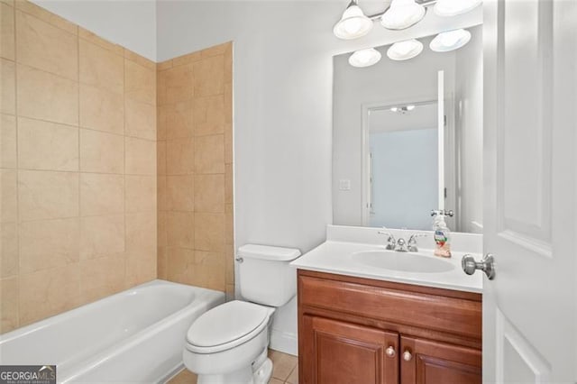 bathroom featuring toilet, tub / shower combination, and vanity