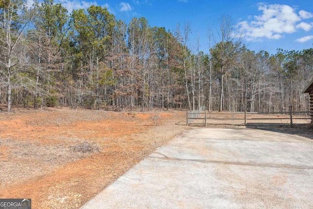 view of yard featuring a gate and fence