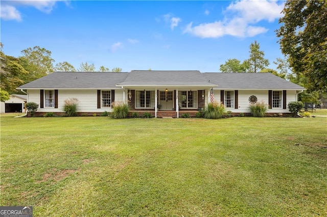 ranch-style home featuring a front lawn