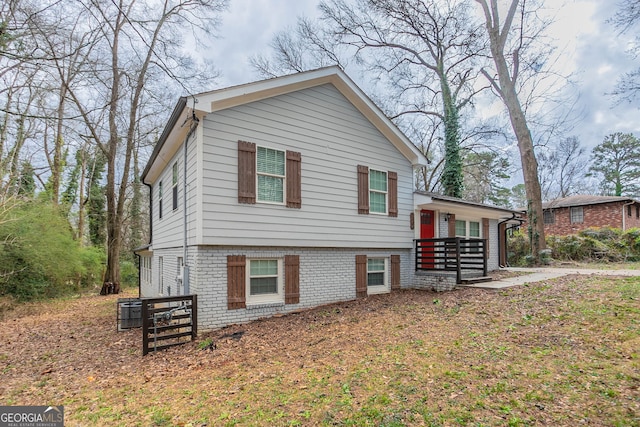 view of front of house with brick siding