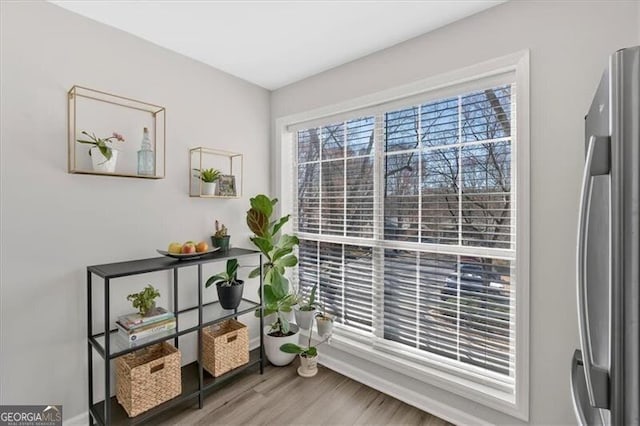 doorway to outside featuring wood finished floors