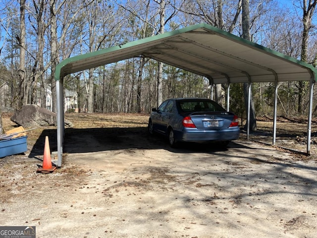 view of parking / parking lot featuring a carport