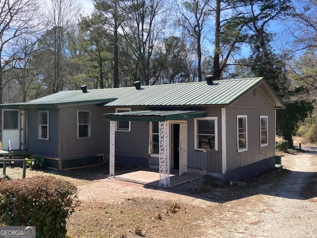 view of front of home with metal roof