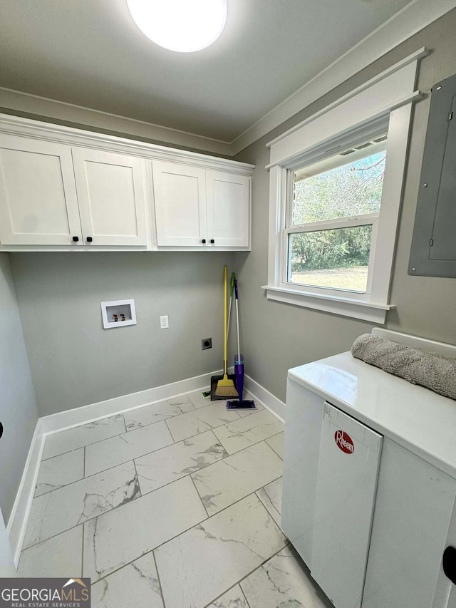 washroom with hookup for a washing machine, baseboards, marble finish floor, cabinet space, and electric panel