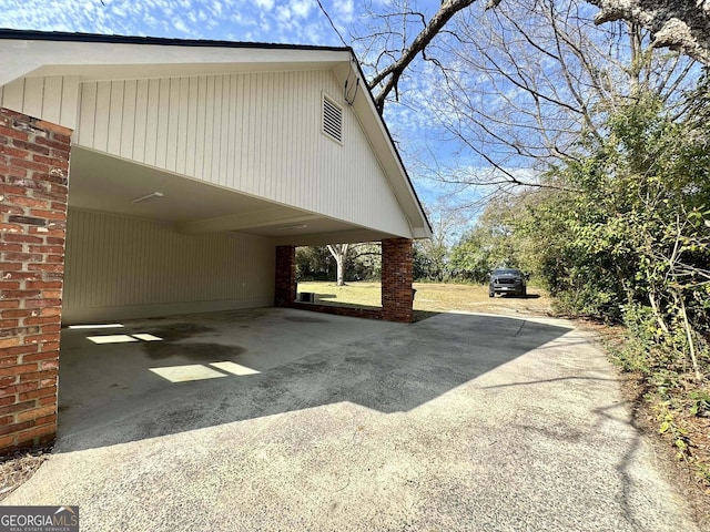 view of car parking featuring driveway