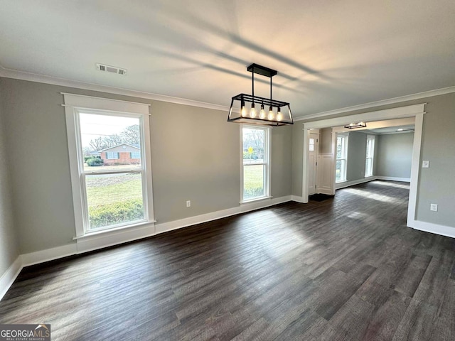 unfurnished dining area with ornamental molding, visible vents, and dark wood-style floors