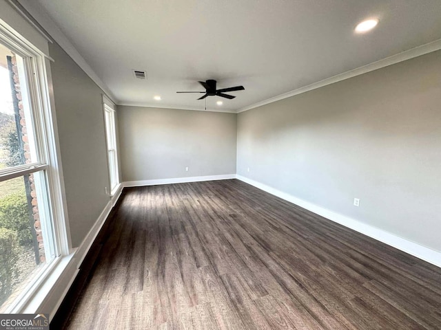 unfurnished room with baseboards, dark wood finished floors, a ceiling fan, ornamental molding, and recessed lighting