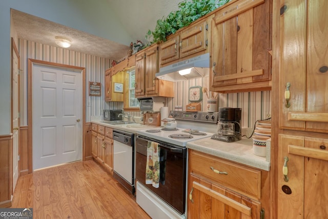 kitchen with wallpapered walls, electric range, white dishwasher, a textured ceiling, and under cabinet range hood