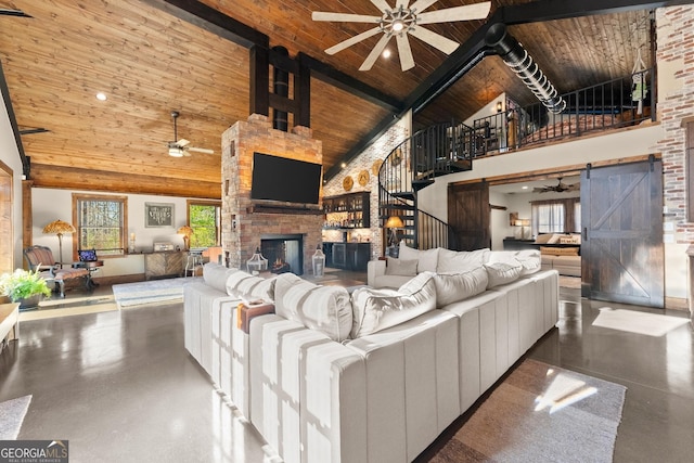 living area with a fireplace, wooden ceiling, a ceiling fan, and high vaulted ceiling