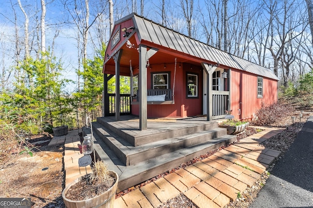 view of outdoor structure with a porch