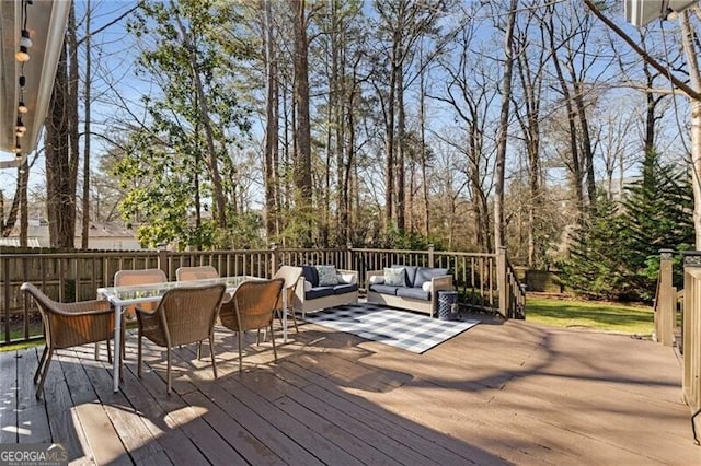 wooden deck featuring outdoor dining area and outdoor lounge area