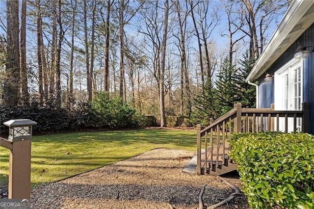 view of yard featuring a wooden deck