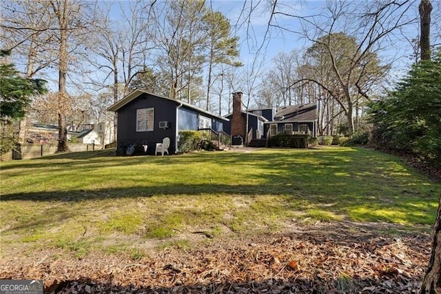 view of yard featuring a deck