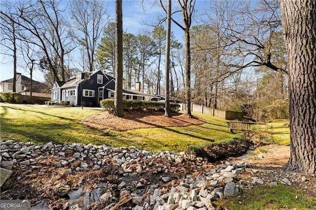 view of yard featuring fence