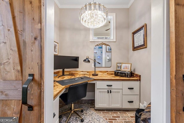 office area with a chandelier, ornamental molding, brick floor, and baseboards