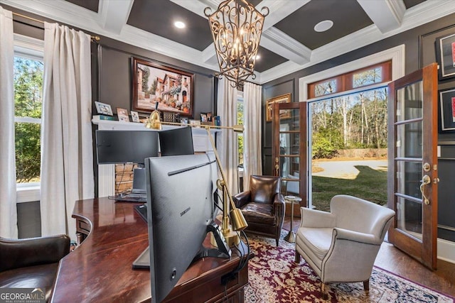 office featuring ornamental molding, beam ceiling, coffered ceiling, and an inviting chandelier