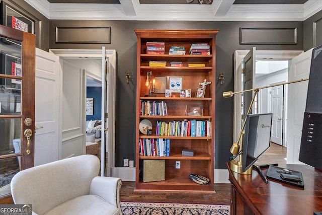 office area featuring ornamental molding, beam ceiling, coffered ceiling, and wood finished floors