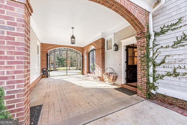 entrance to property with brick siding