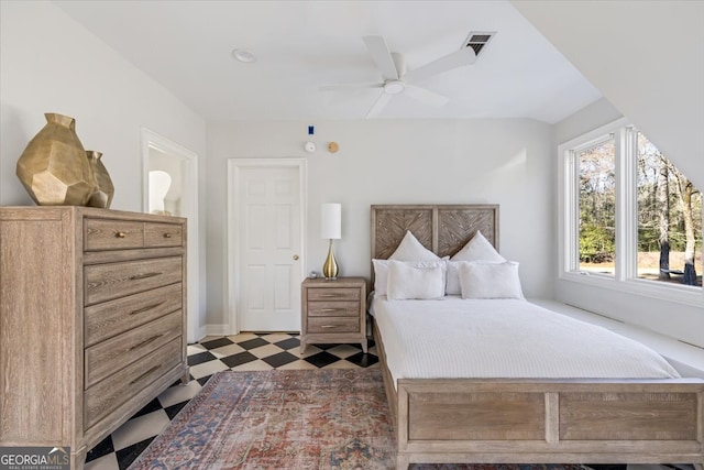 bedroom with visible vents, a ceiling fan, and tile patterned floors