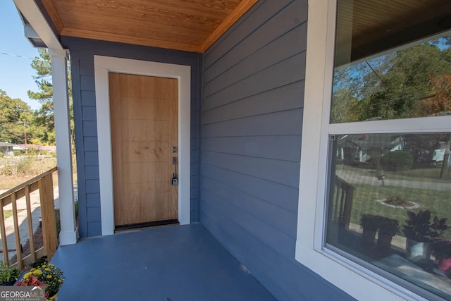 property entrance with a porch