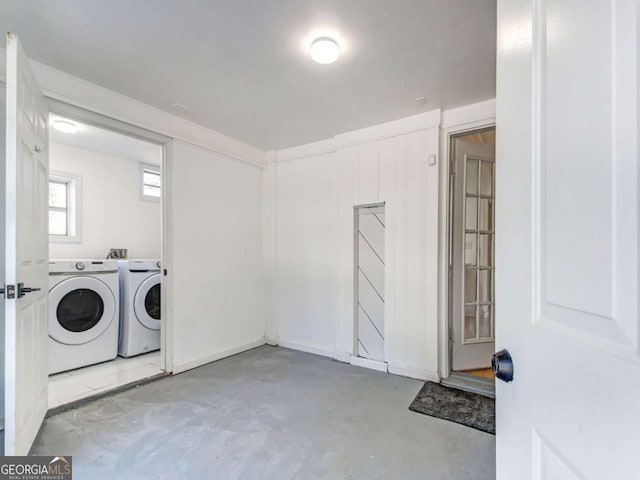 laundry area featuring laundry area and washing machine and clothes dryer