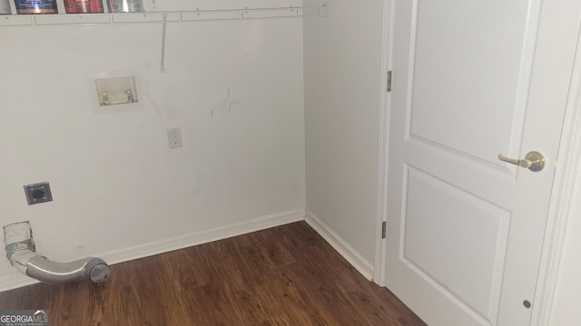 clothes washing area with dark wood-style flooring, electric dryer hookup, and baseboards