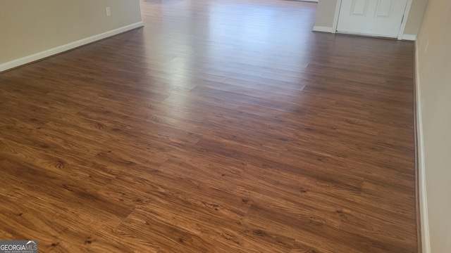 room details with wood finished floors and baseboards