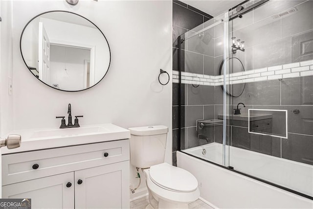 full bathroom featuring vanity, toilet, visible vents, and shower / bath combination with glass door