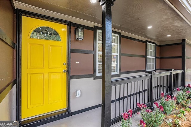 doorway to property with a porch