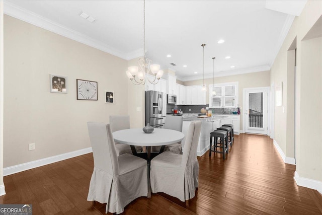 dining space featuring baseboards, dark wood-type flooring, and ornamental molding