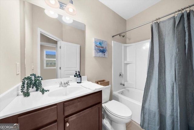 bathroom with toilet, vanity, and shower / bath combo with shower curtain