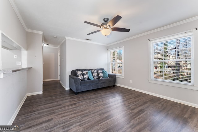 unfurnished room with visible vents, baseboards, a ceiling fan, dark wood-style floors, and ornamental molding