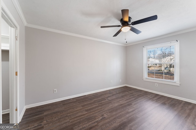 unfurnished bedroom featuring dark wood-style floors, crown molding, a ceiling fan, and baseboards