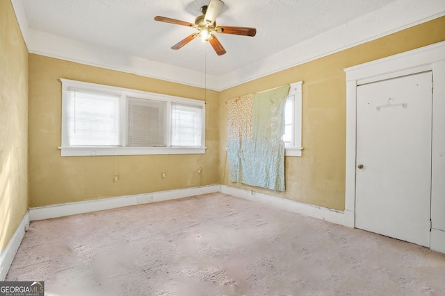 empty room with a ceiling fan