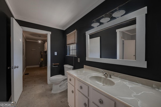 bathroom featuring toilet, baseboards, ornamental molding, and vanity