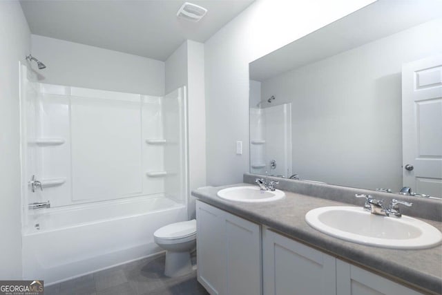 full bathroom featuring bathtub / shower combination, visible vents, a sink, and toilet