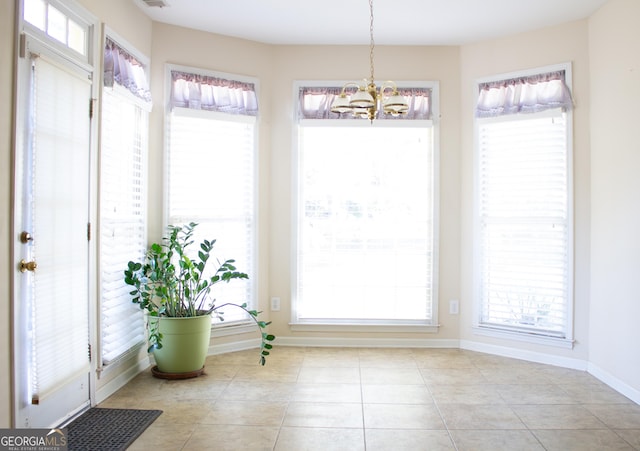 interior space featuring an inviting chandelier and a wealth of natural light