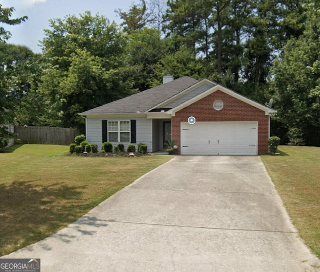 ranch-style house with fence, a chimney, a front lawn, concrete driveway, and a garage