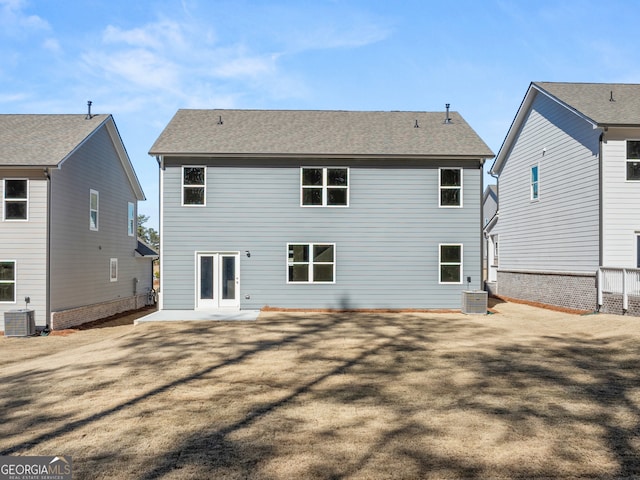 back of property featuring central AC and a patio